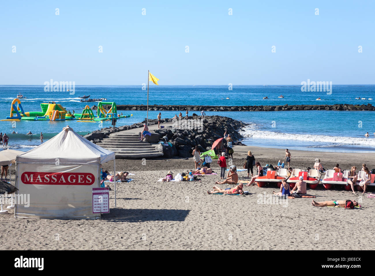COSTA ADEJE, TENERIFE, CANARY, SPAIN-CIRCA JAN, 2016: Tent for massage and  spa is on sandy beach the Torviscas. Torviscas and Fanabe are city resorts  Stock Photo - Alamy