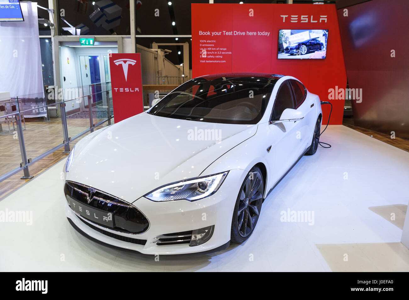 HELSINKI, FINLANDCIRCA DEC, 2015 The Tesla car with inserted plugin