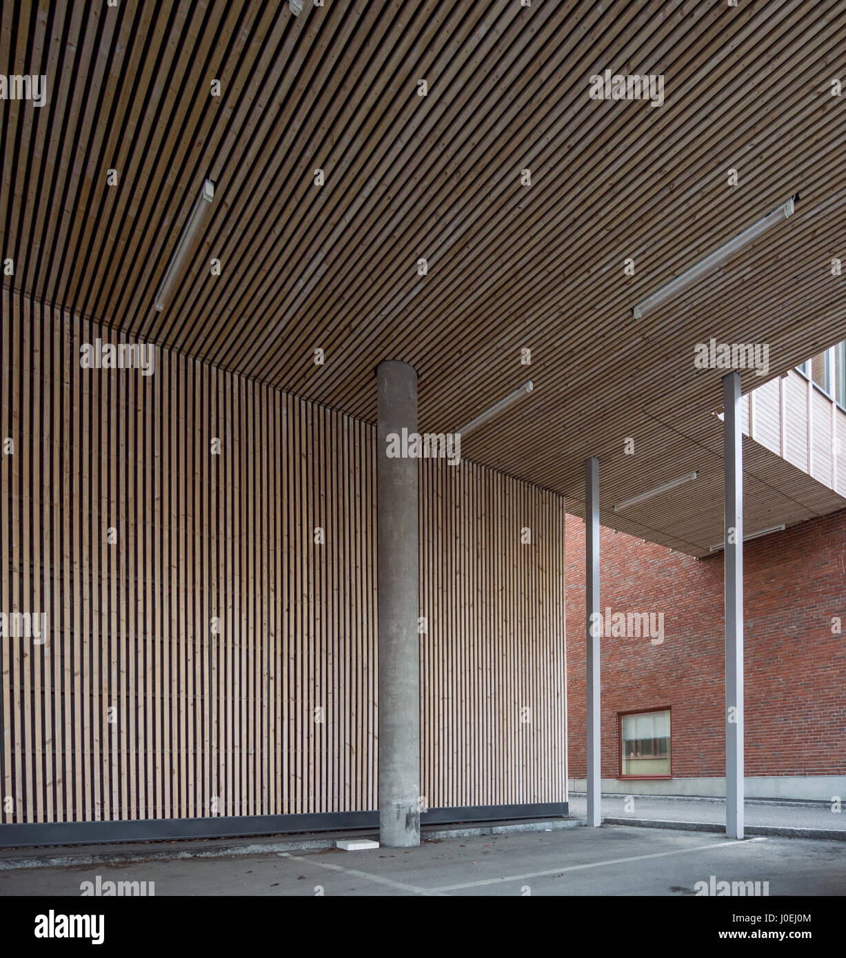 an empty parking of a wooden building is Sweden can make a good architectural background Stock Photo