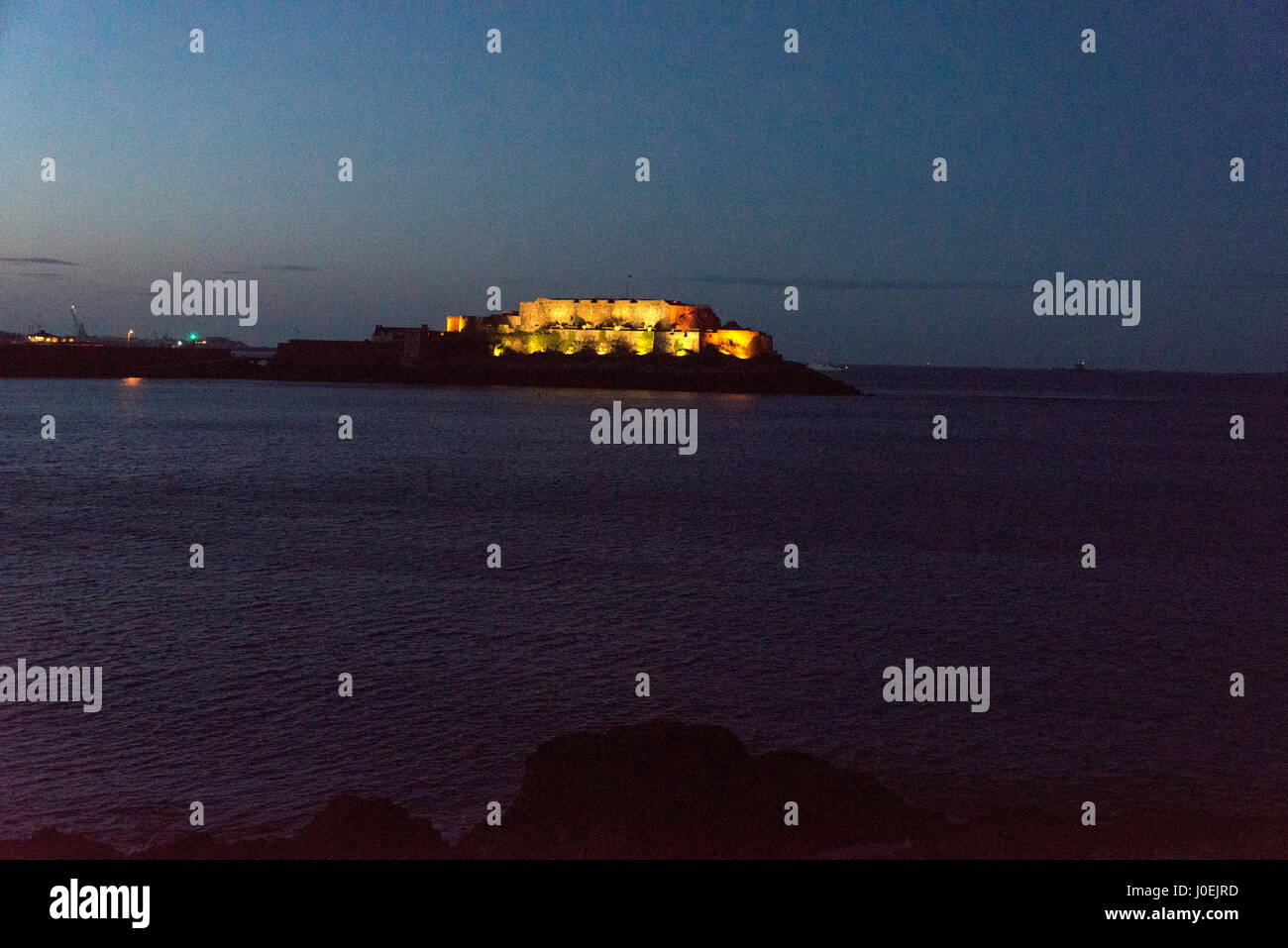 The 800 yearly Castle at night in St. Peter Port in Guernsey in