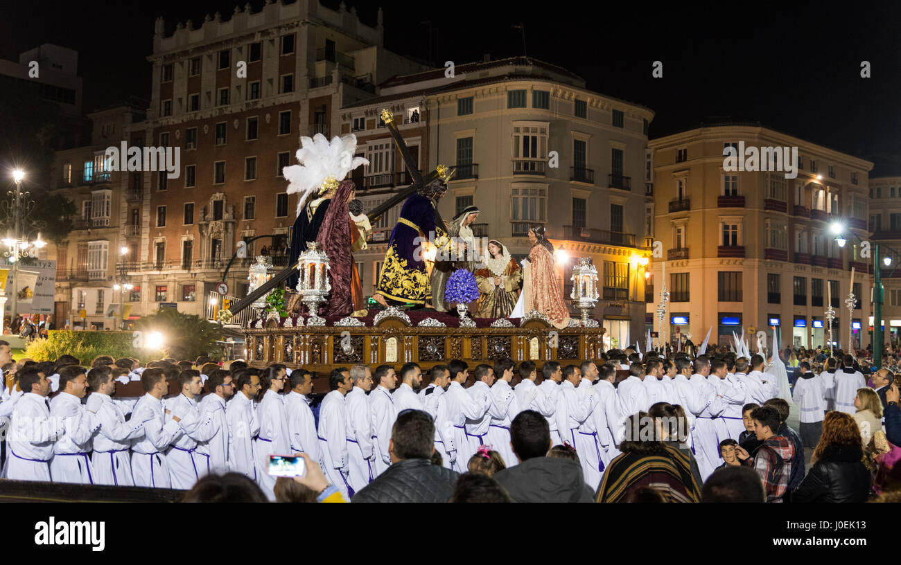 MALAGA,SPAIN-APRIL 09 2017:Unidentified people walking in the catholic processions called Semena Santa in Malaga on April 09 2017, this processions ar Stock Photo