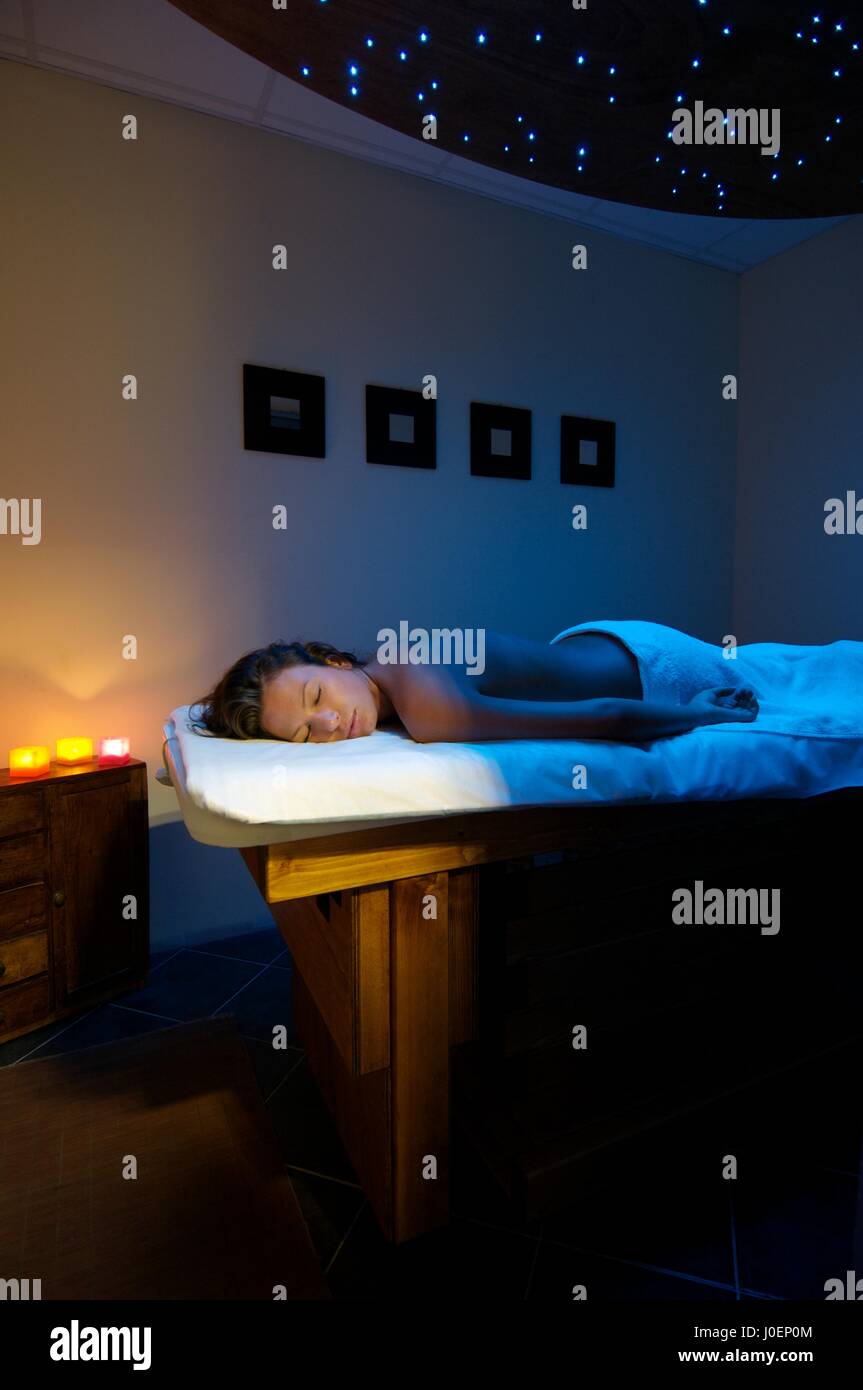 woman doing color therapy chromotherapy in spa room Stock Photo - Alamy