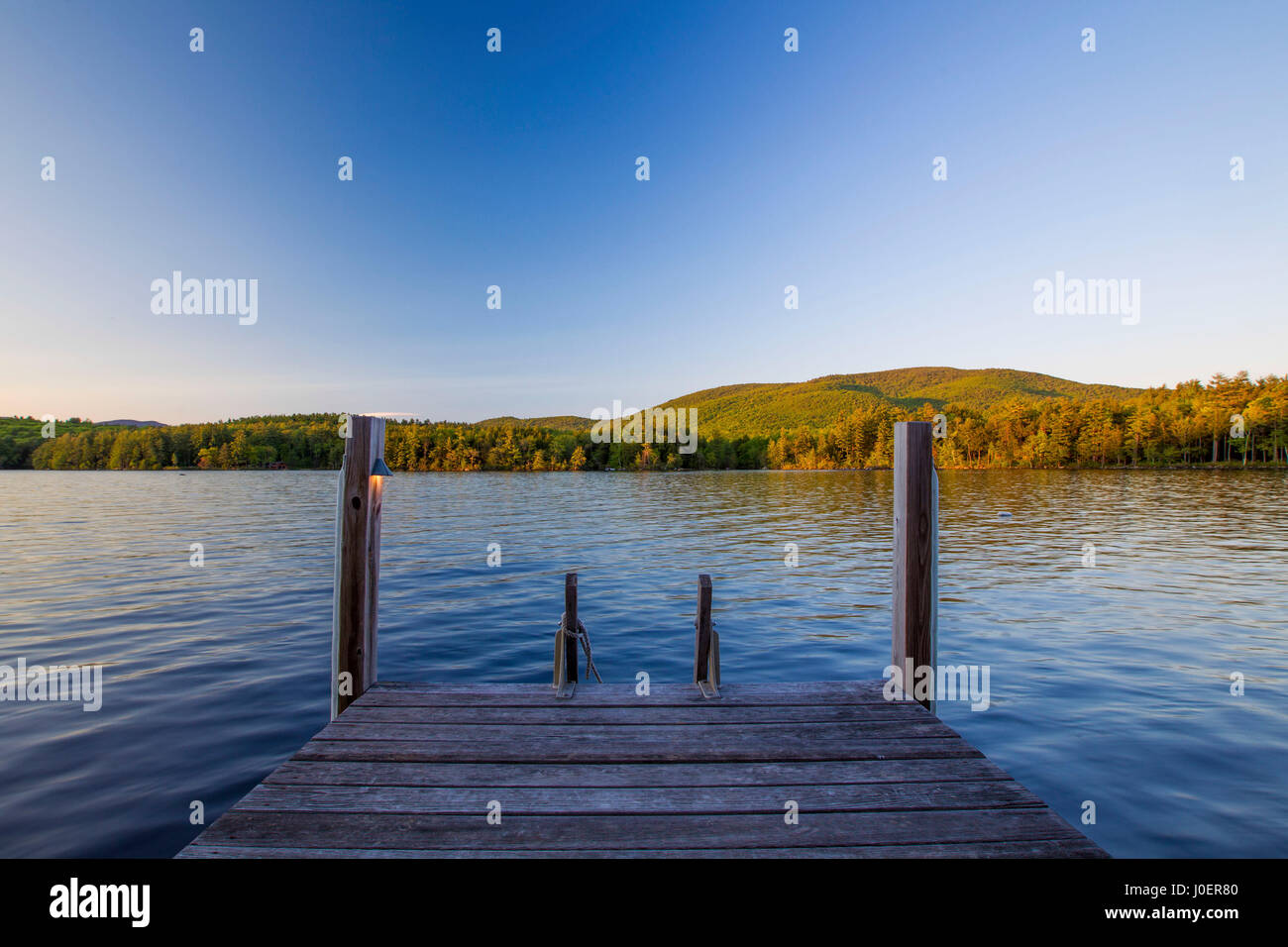 A dock on Squam Lake in the Lakes Region of New Hampshire. Stock Photo