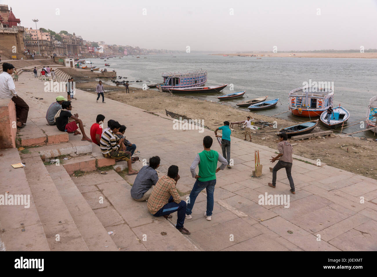 Children playing cricket on ghats, varanasi, uttar pradesh, india, asia Stock Photo