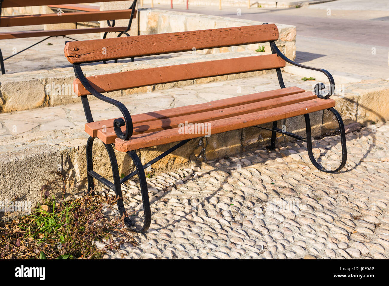 Wooden benches in the city park Stock Photo - Alamy