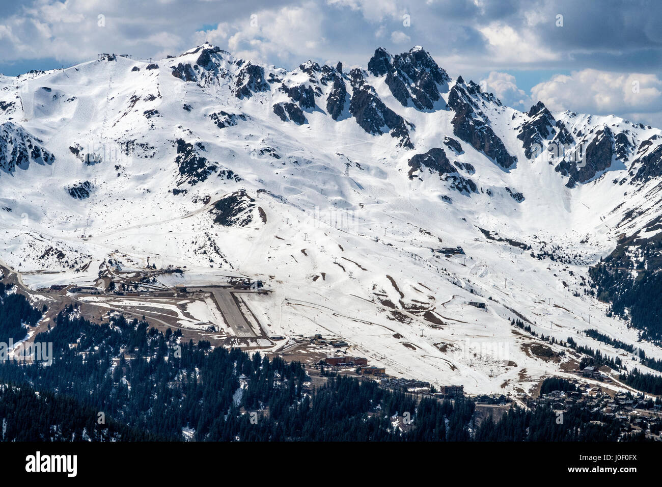 Courchevel Altiport (French: Altiport de Courchevel) (IATA: CVF, ICAO: LFLJ) is an altiport serving Courchevel, a ski resort in the French Alps. The a Stock Photo