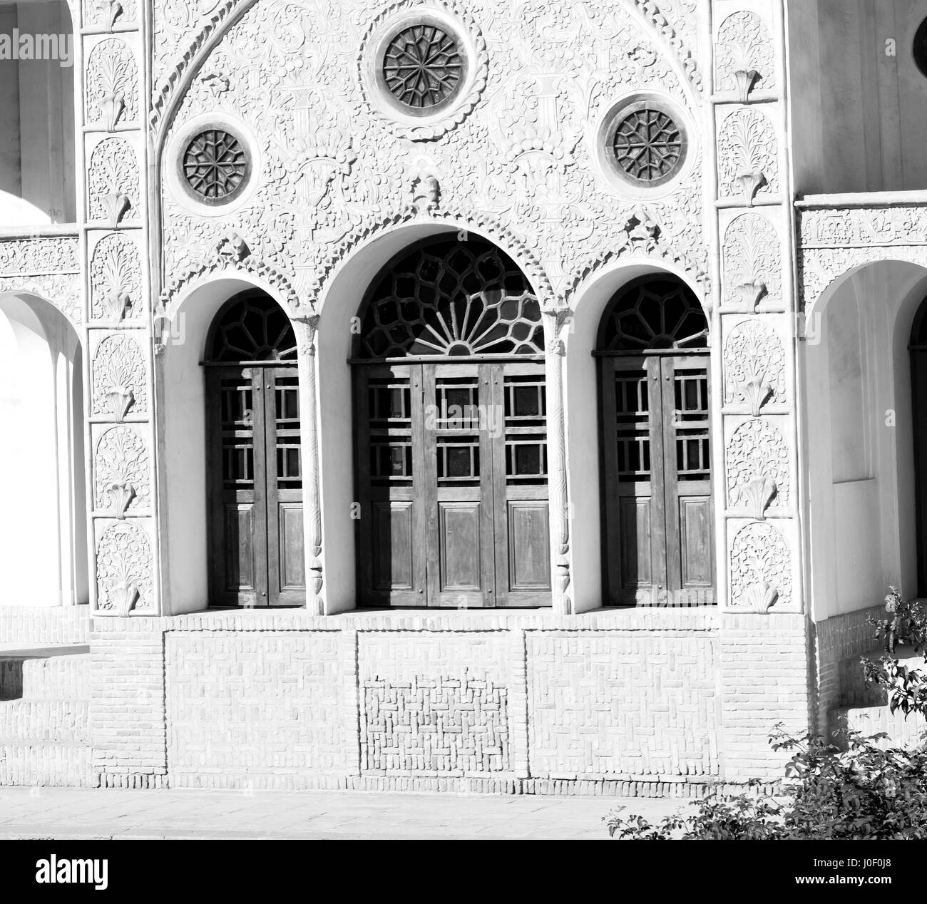 blur in iran kashan the old persian architecture window and glass in background Stock Photo