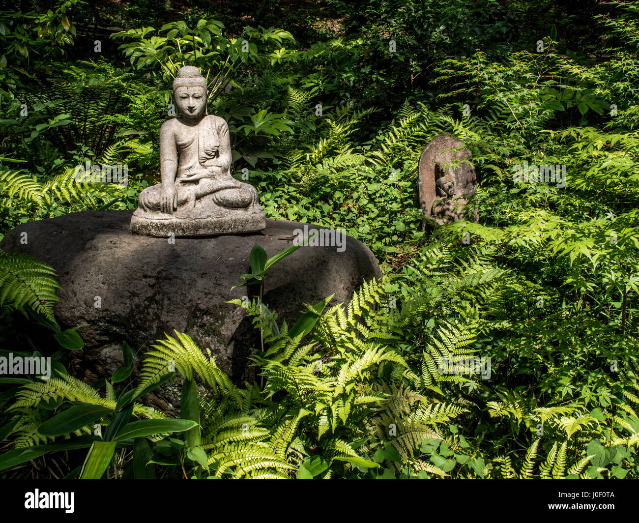 Buddhist statues in the garden of Gotoh Museumn. Kaminoge, Setagaya, Tokyo, Japan Stock Photo