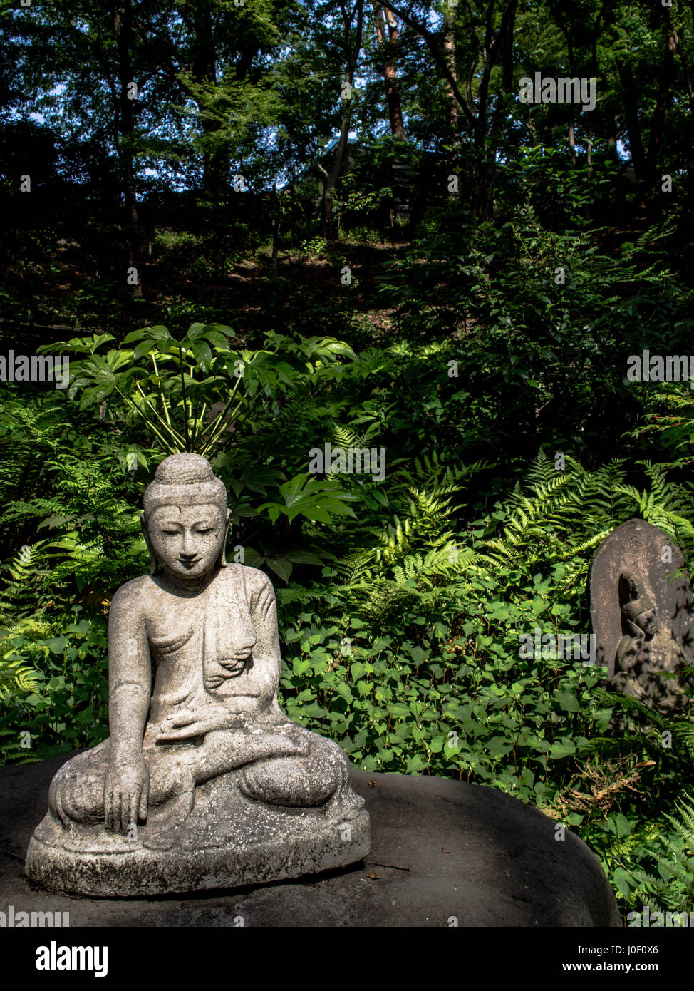 Buddhist statues in the garden of Gotoh Museumn. Kaminoge, Setagaya, Tokyo, Japan Stock Photo