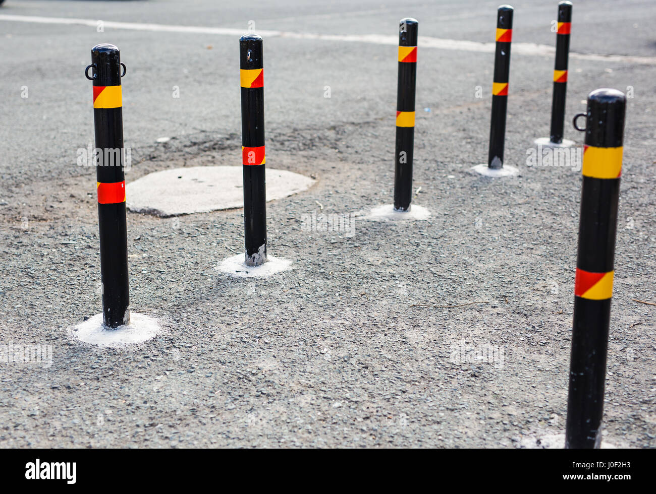 Columns that restrict the movement of vehicles and Parking, bars for ...