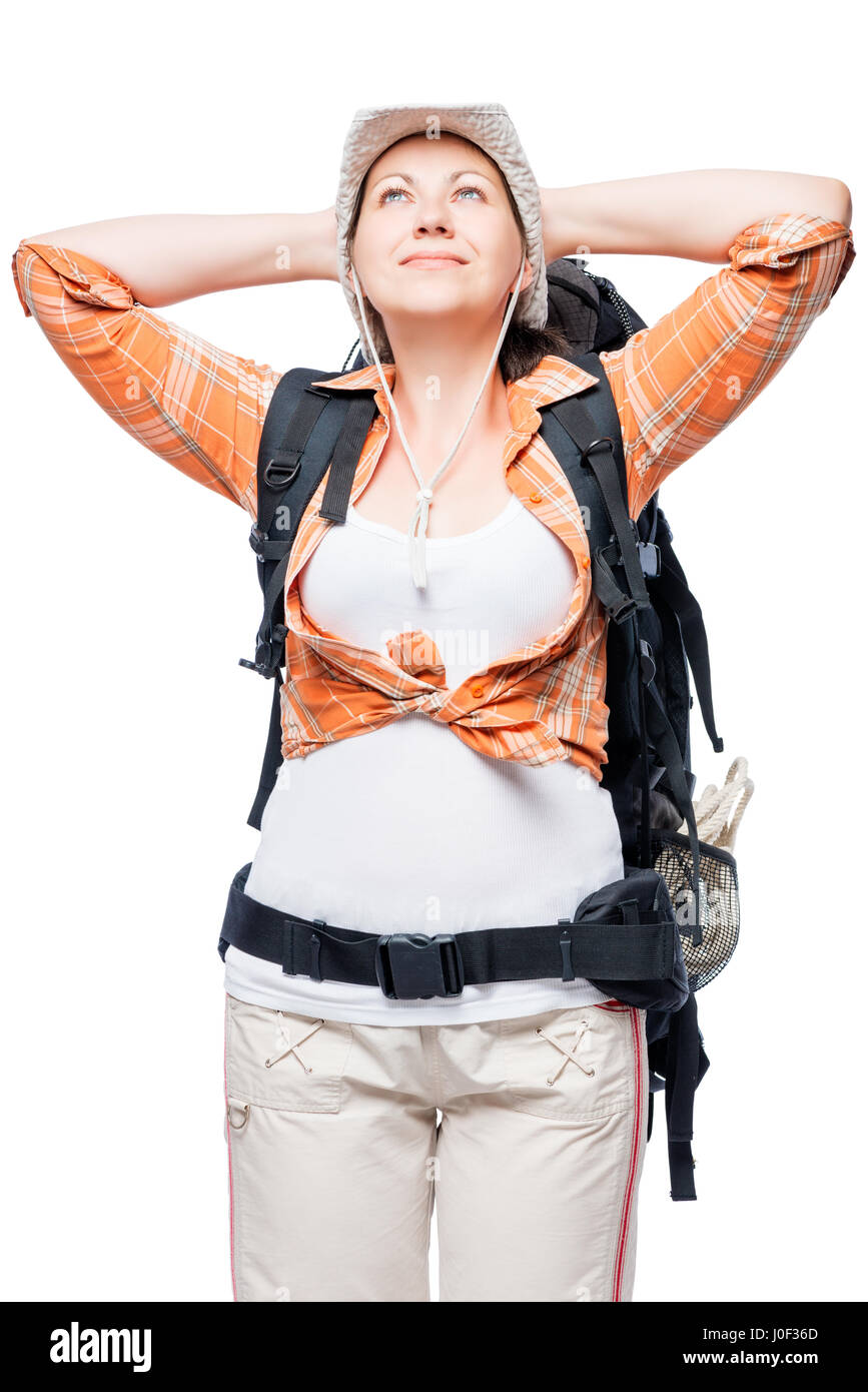 Backing Up Lady Lady with a backpack relaxes look up on a white background Stock Photo ...