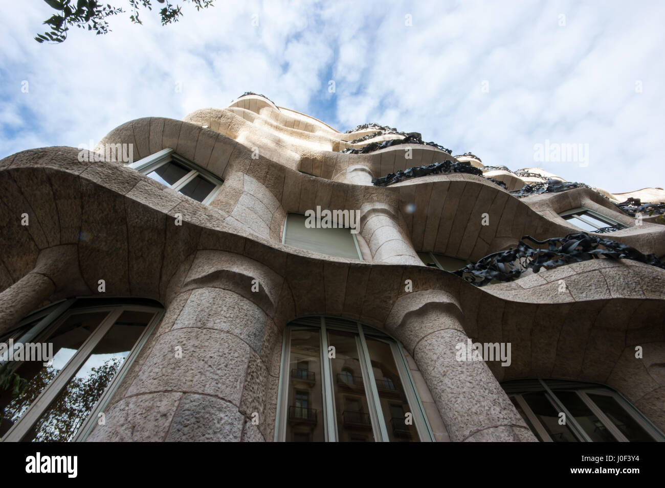 Antoni Gaudí, Casa Milà house, also known as La Pedrera, 1906-1912, Catalan Modernist architecture, Barcelona, Spain, view from below Stock Photo