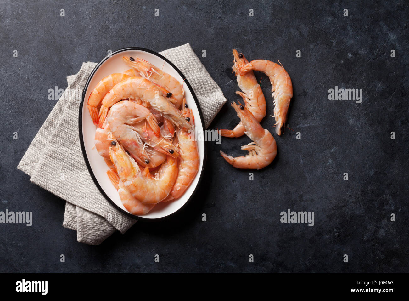 Fresh seafood on stone table. Shrimps. Top view with copy space Stock ...