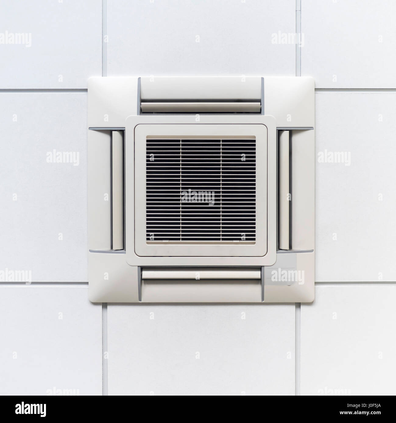 Air Conditioner for climate control on ceiling, modern design for office or industry. Stock Photo
