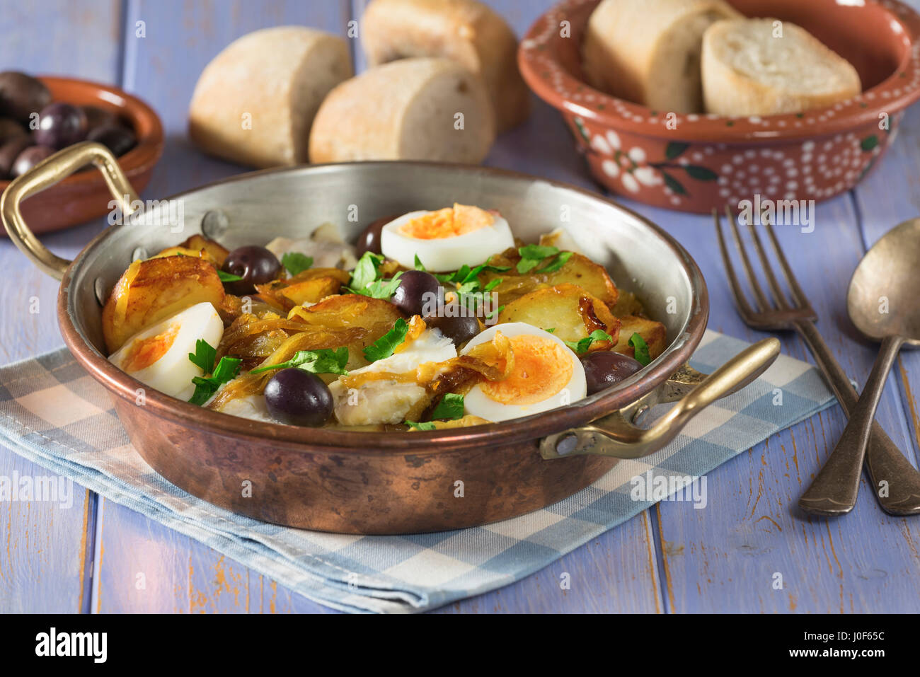 Bacalhau à Gomes de Sá. Salt cod with potato and onion. Portugal Food