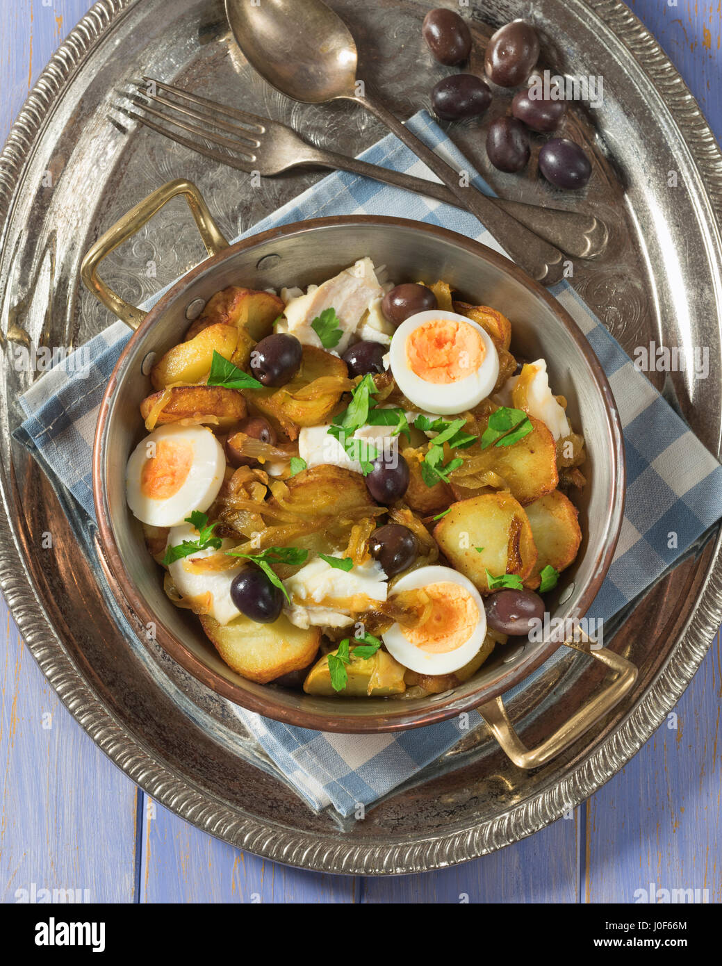 Bacalhau à Gomes de Sá. Salt cod with potato and onion. Portugal Food