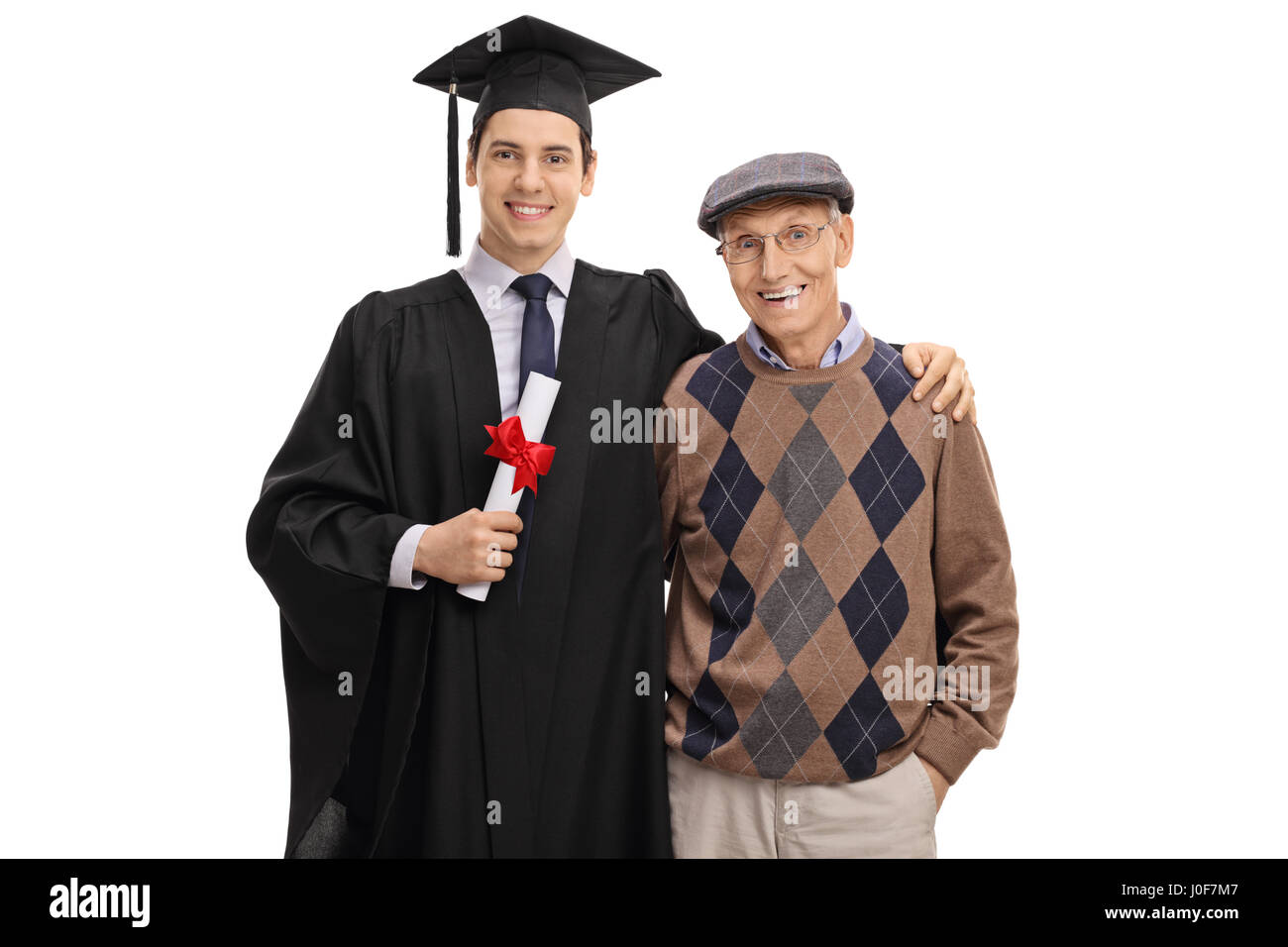Graduate student and his grandfather looking at the camera and smiling isolated on white background Stock Photo