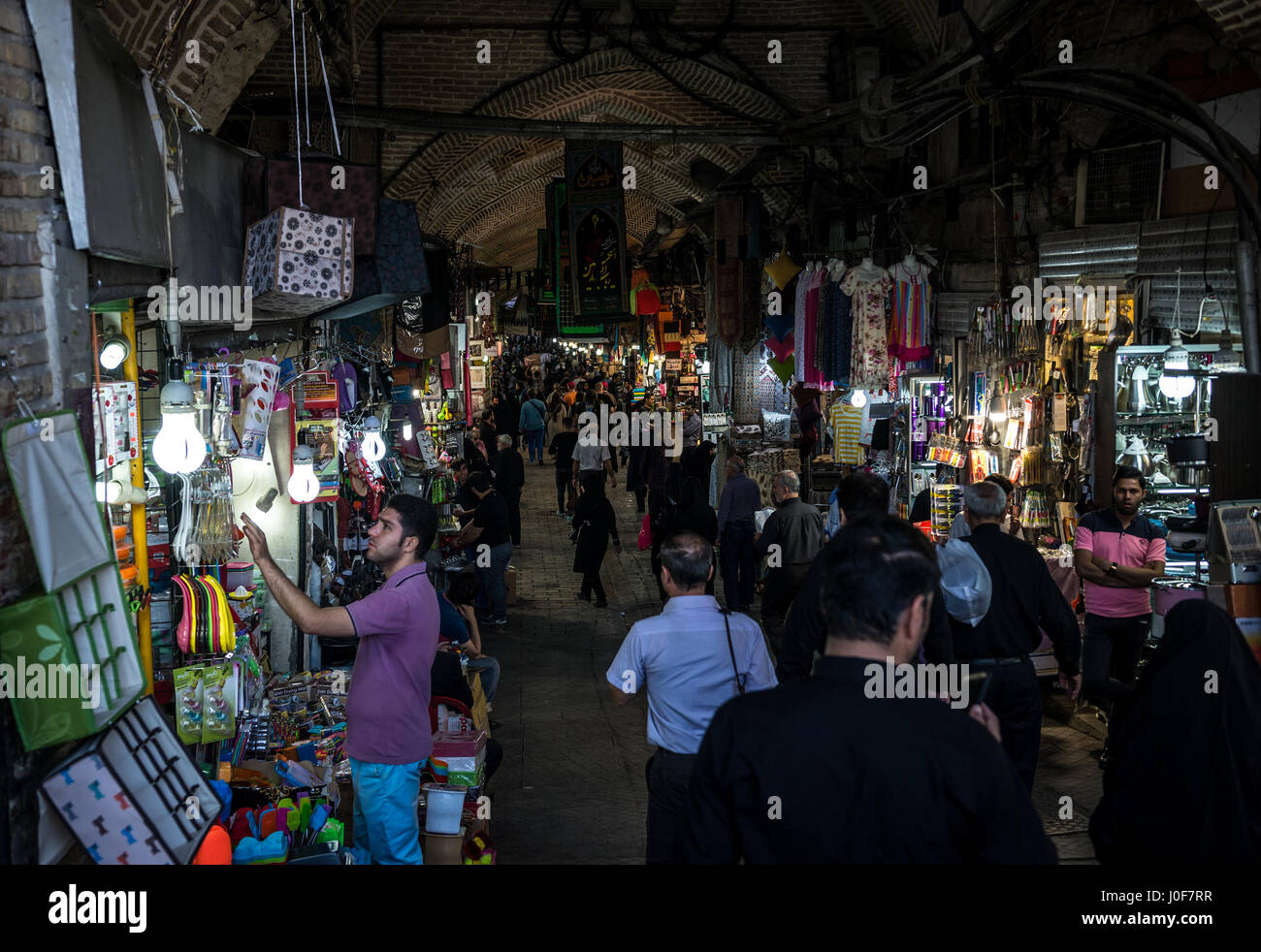 One of the main alleways with shops on the Grand Bazaar in Tehran city, capital of Iran and Tehran Province Stock Photo