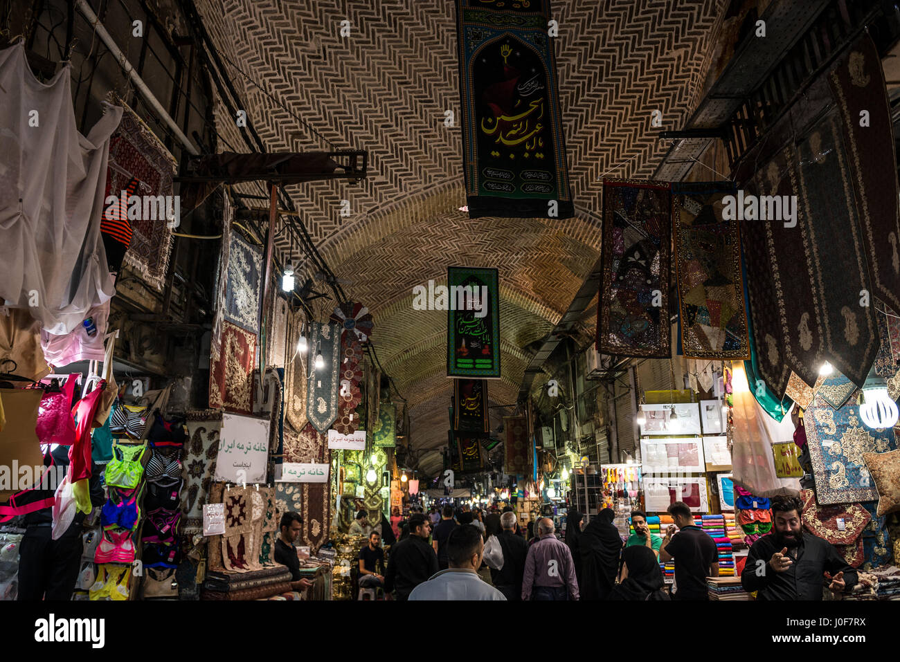 One of the main alleways with shops on the Grand Bazaar in Tehran city, capital of Iran and Tehran Province Stock Photo