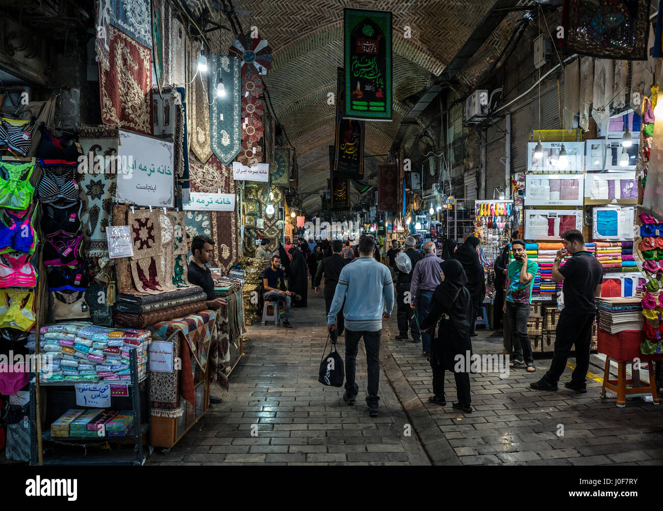 One of the main alleways with shops on the Grand Bazaar in Tehran city, capital of Iran and Tehran Province Stock Photo