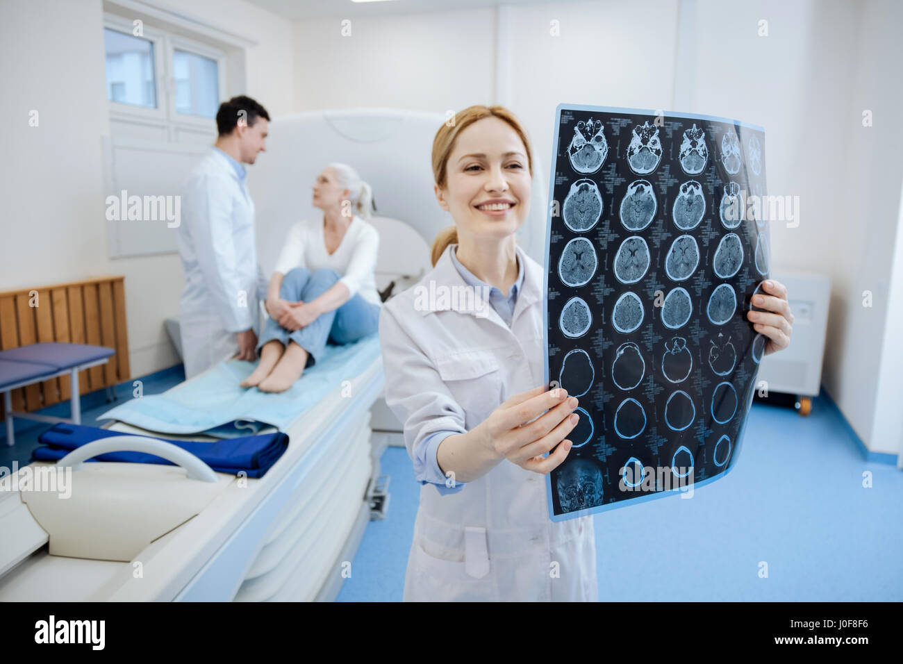 Happy joyful doctor seeing no brain problems Stock Photo