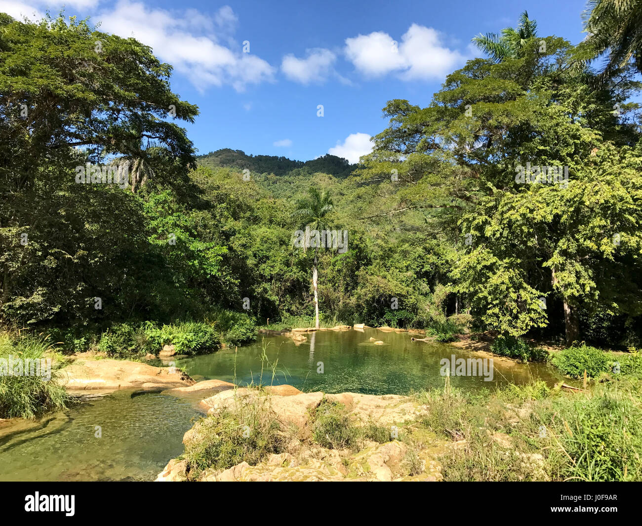 El Nicho Waterfalls in Cuba. El Nicho is located inside the Gran Parque Natural Topes de El Nicho Waterfalls in Cuba. El Nicho is located inside the Gran Parque Natural Topes de