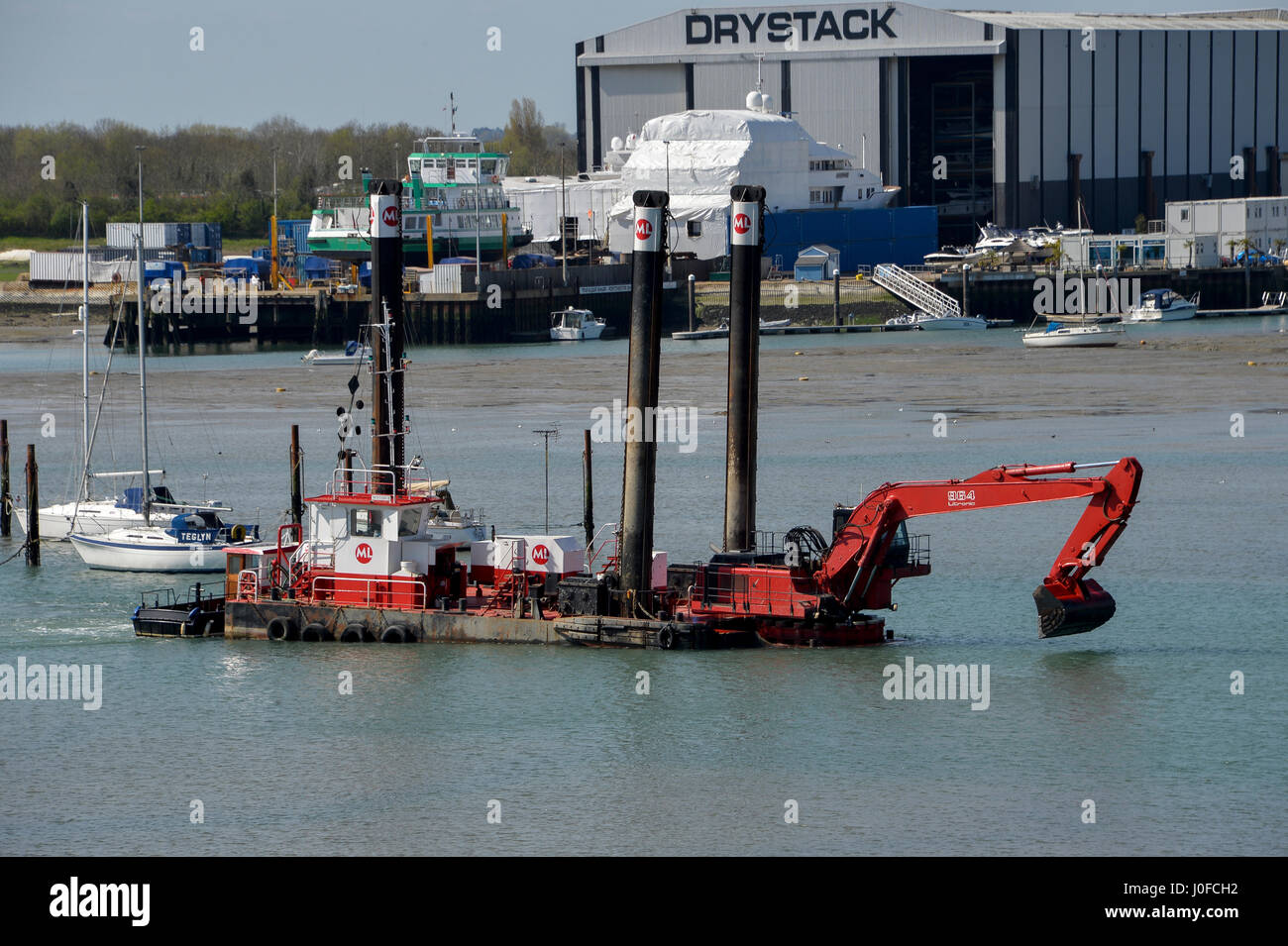 marine dredger in Portsmouth Harbour Stock Photo