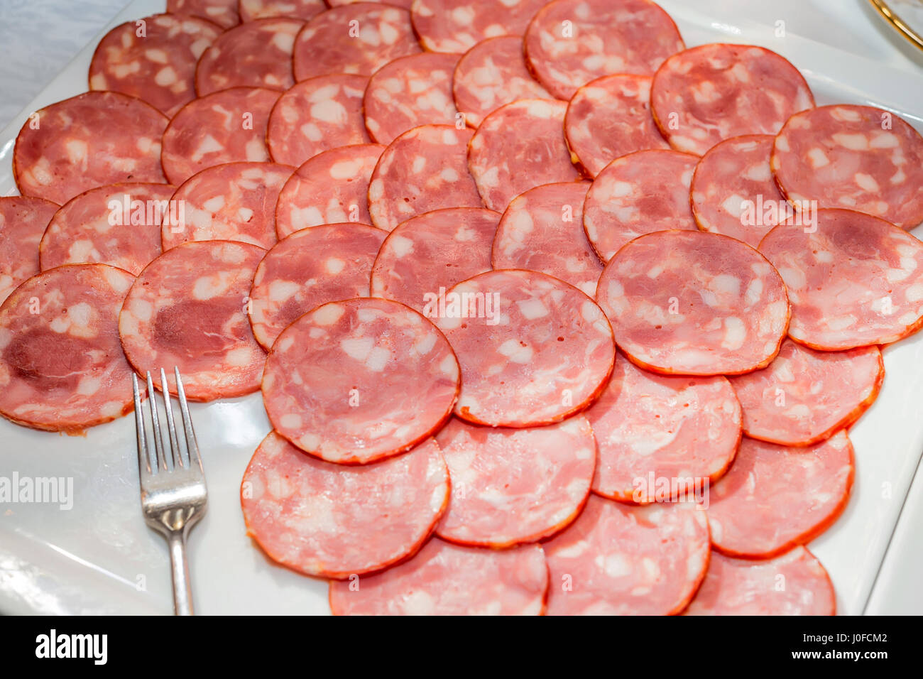 Close-up smoked sausage with meat and fat Stock Photo - Alamy