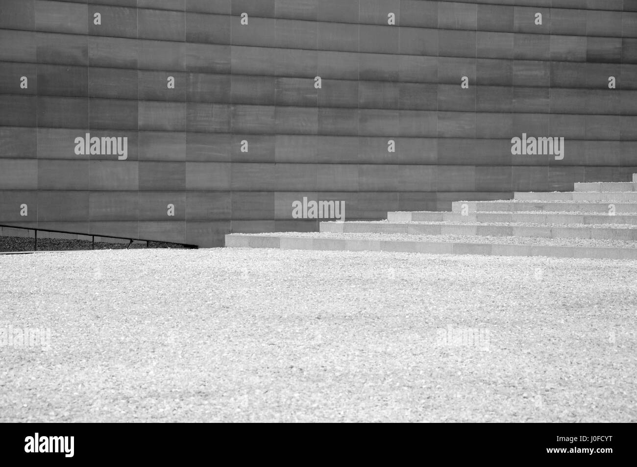An abstract background black and white image of bricks and steps in Nanjing China at the Nanjing Massacre site museum. Stock Photo
