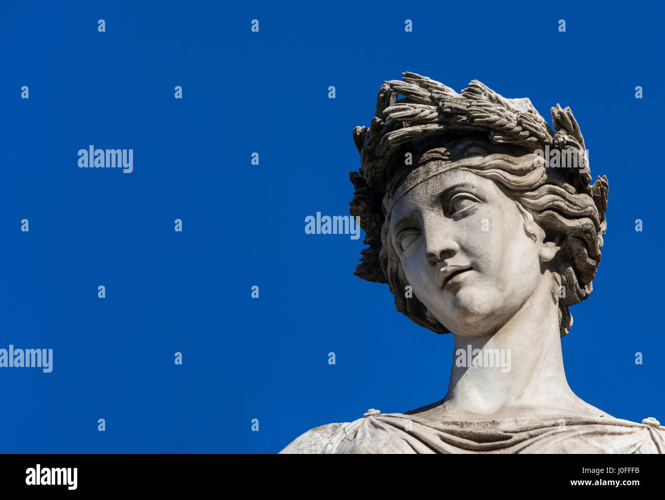 Ancient Roman or Greek neoclassical statue in Rome (with copy space) Stock Photo