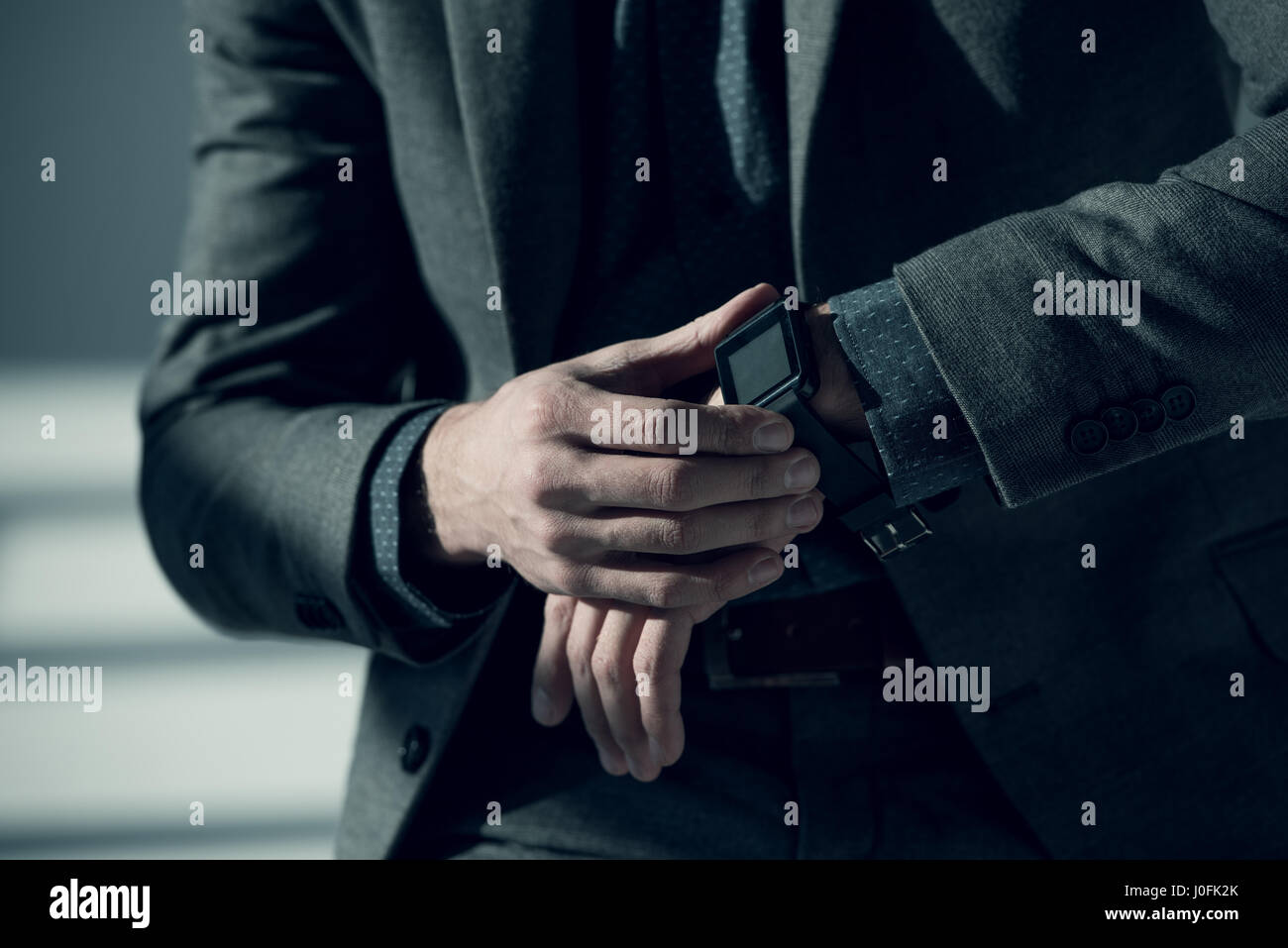 Man in suit up hands hi-res stock photography and images - Alamy