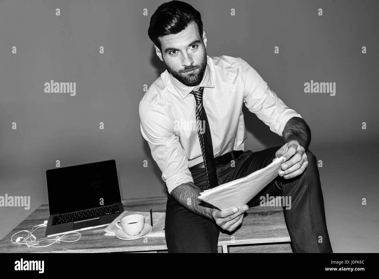 Handsome elegant man working Black and White Stock Photos & Images - Alamy