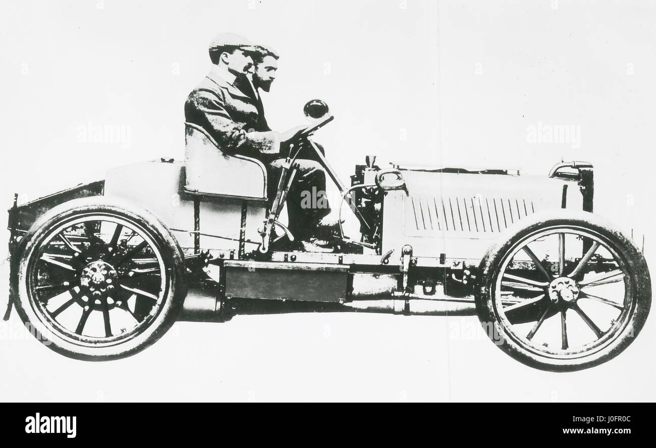 M S Napier (bearded) beside S F Edge in the four cylinder Napier racing car Stock Photo