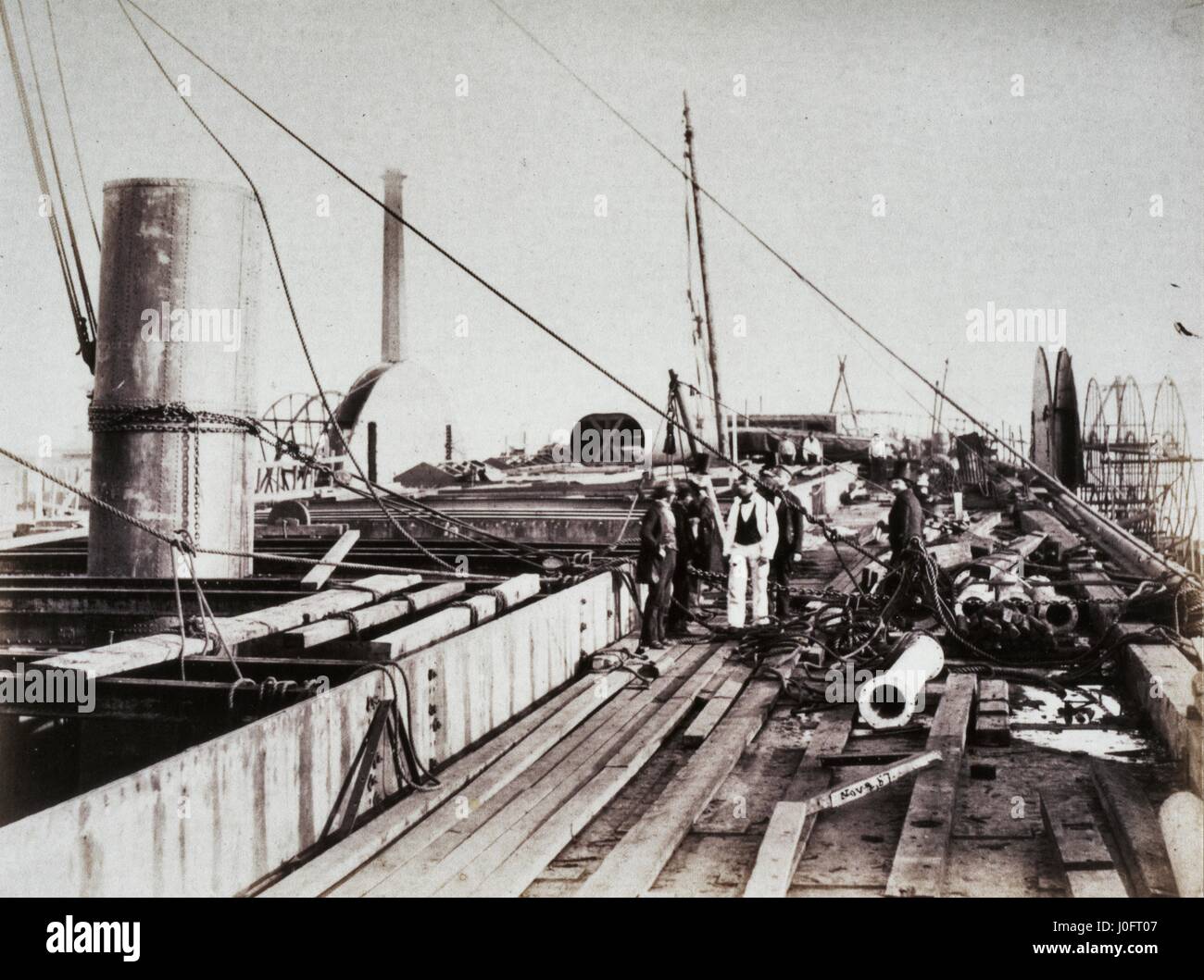 Men stand amongst ropes and chains on the deck of the Great Eastern, 2 November 1857 Stock Photo