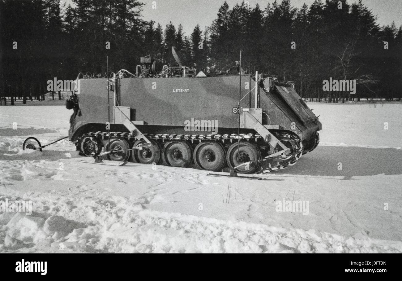 Tracked vehicle on snow to test ground pressure distribution and tractive performance Stock Photo