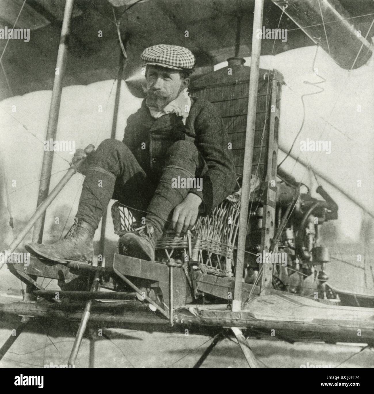 Wicker chair and foot control of Ailerons in Sommer's Farman biplane Stock Photo