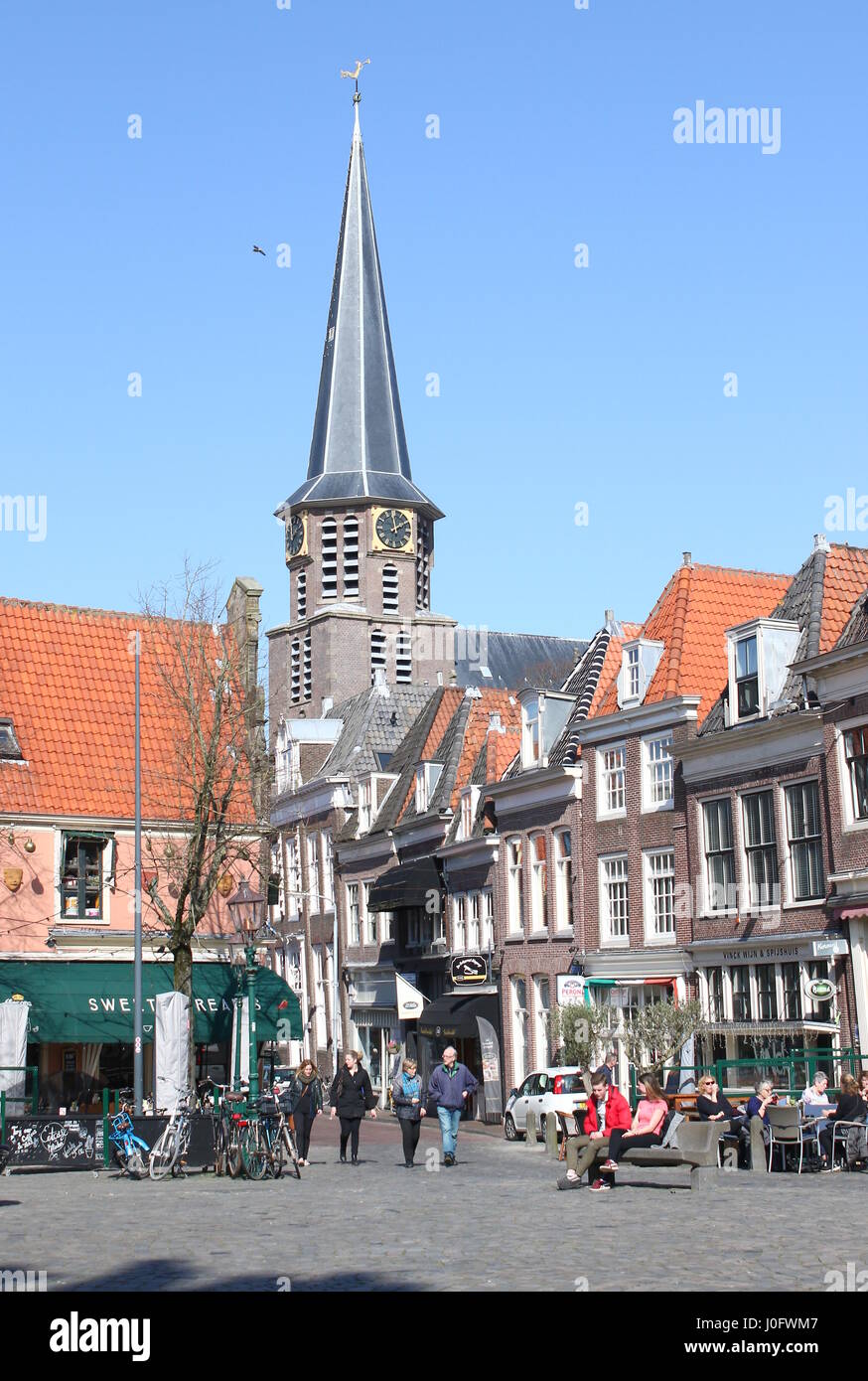 Iconic Grote Kerk church tower seen from Roode Steen square,  Hoorn, North Holland, Netherlands. Stock Photo