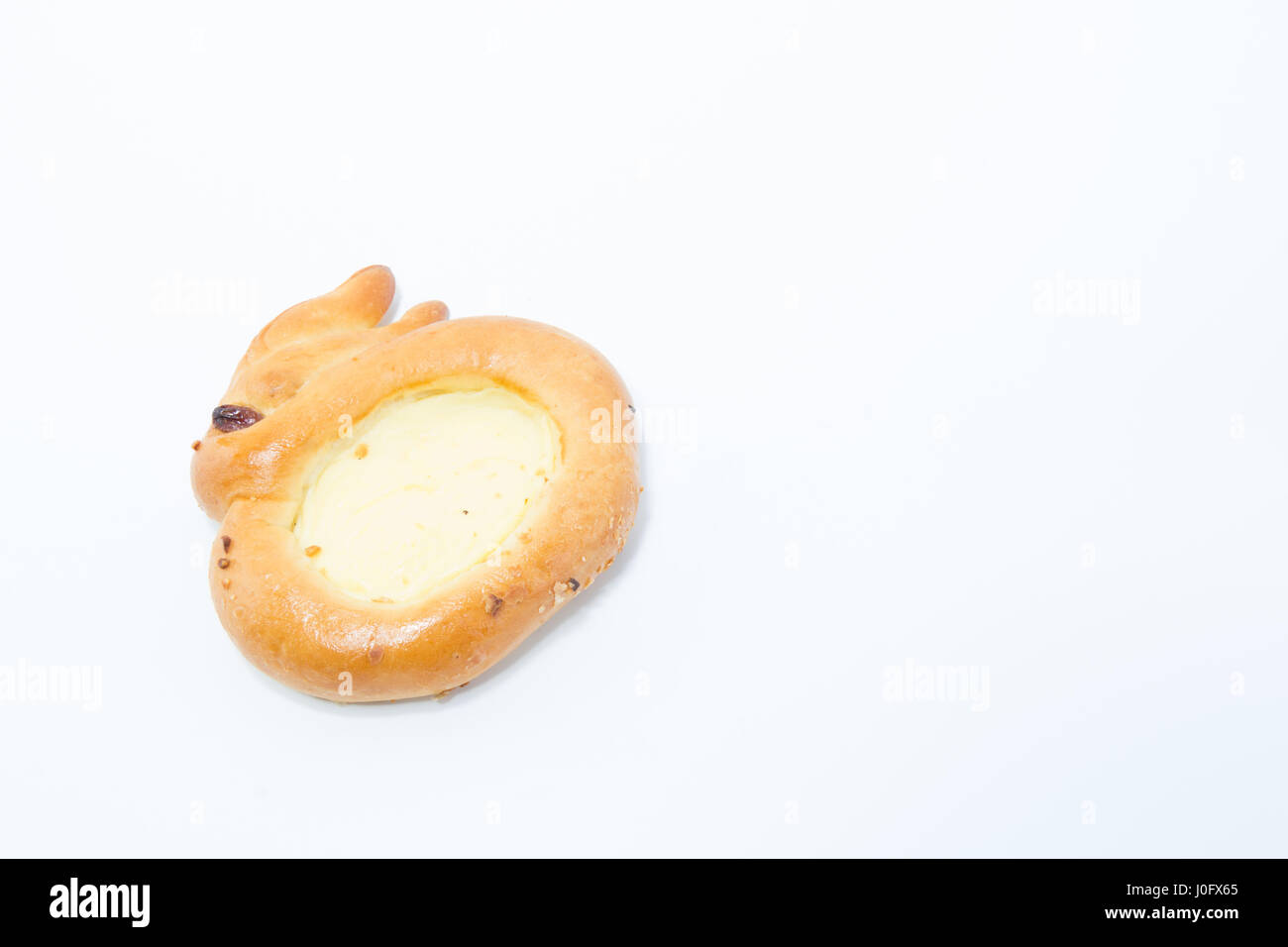 Easter bunny egg tart pastry round and yellow isolated in white background Stock Photo