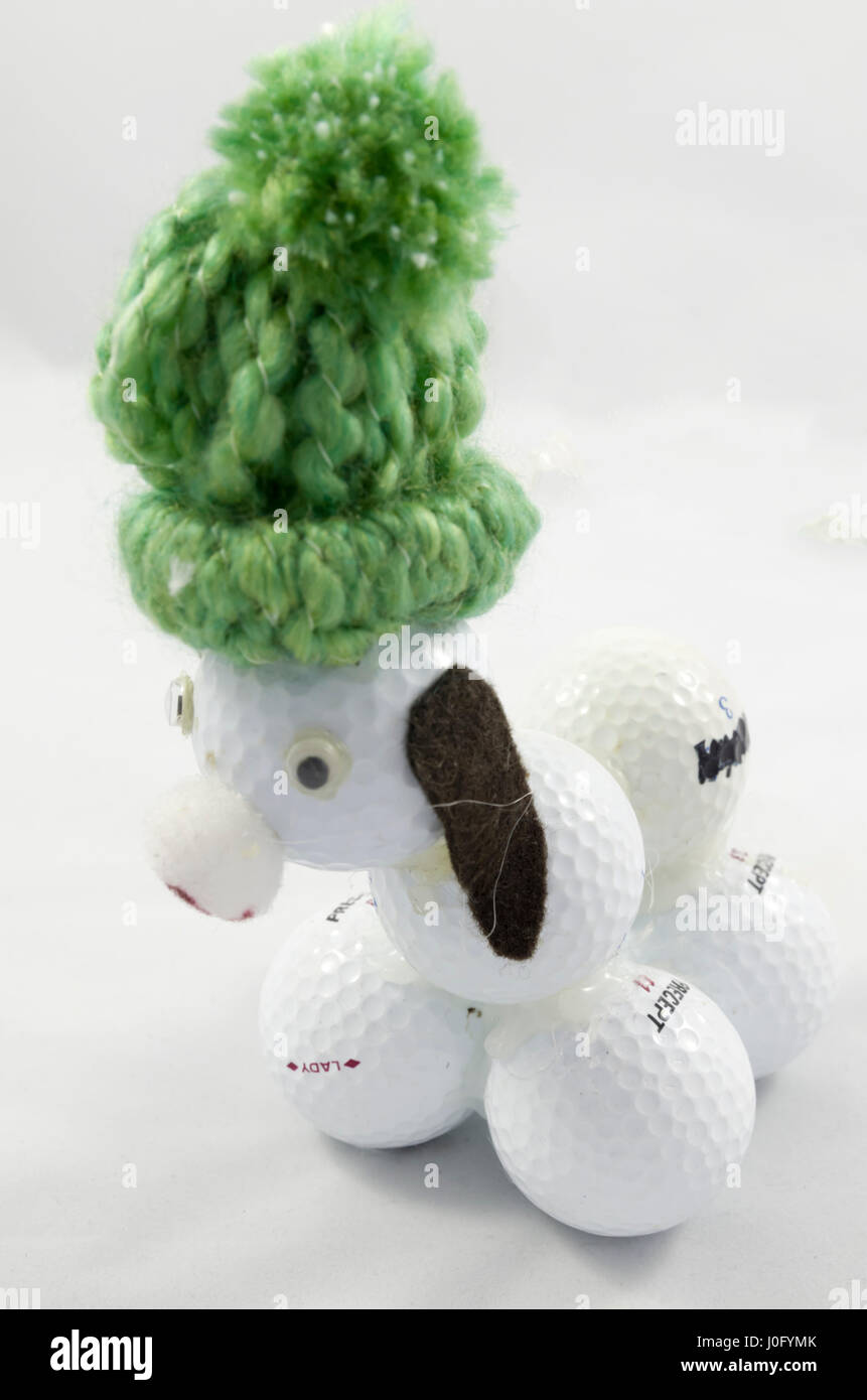 Golf ball dog Stock Photo Alamy