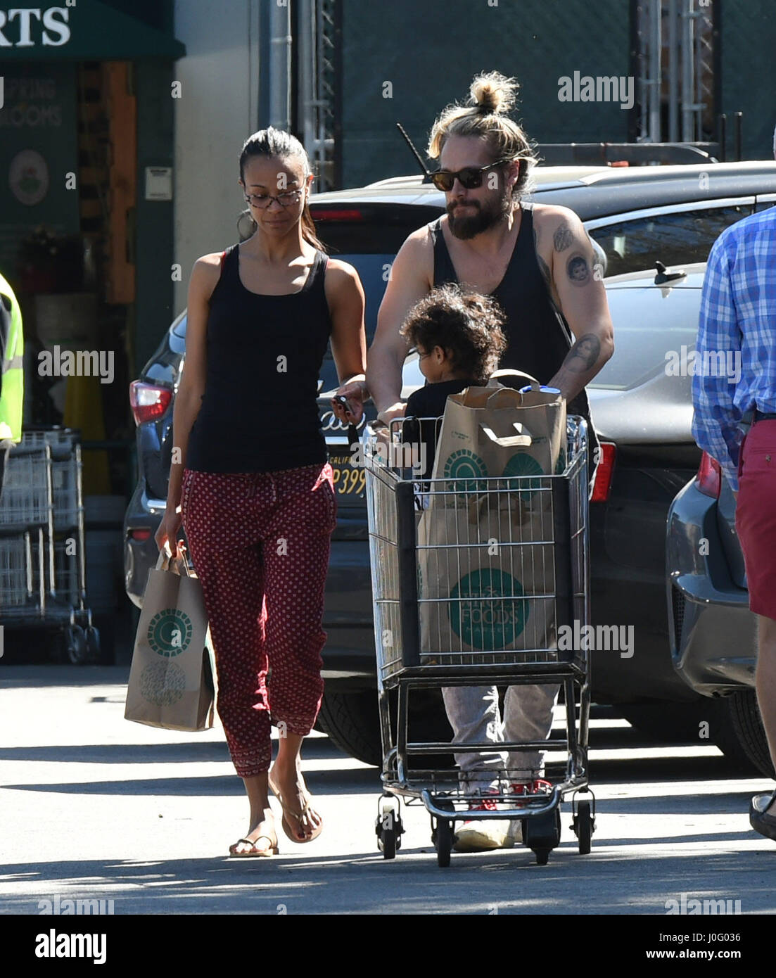 Zoe Saldana with her husband Marco Perego-Saldana and their son grocery