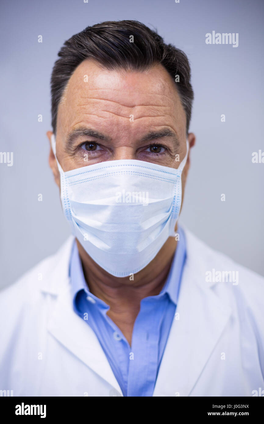 Portrait of dentist wearing surgical mask in dental clinic Stock Photo Alamy