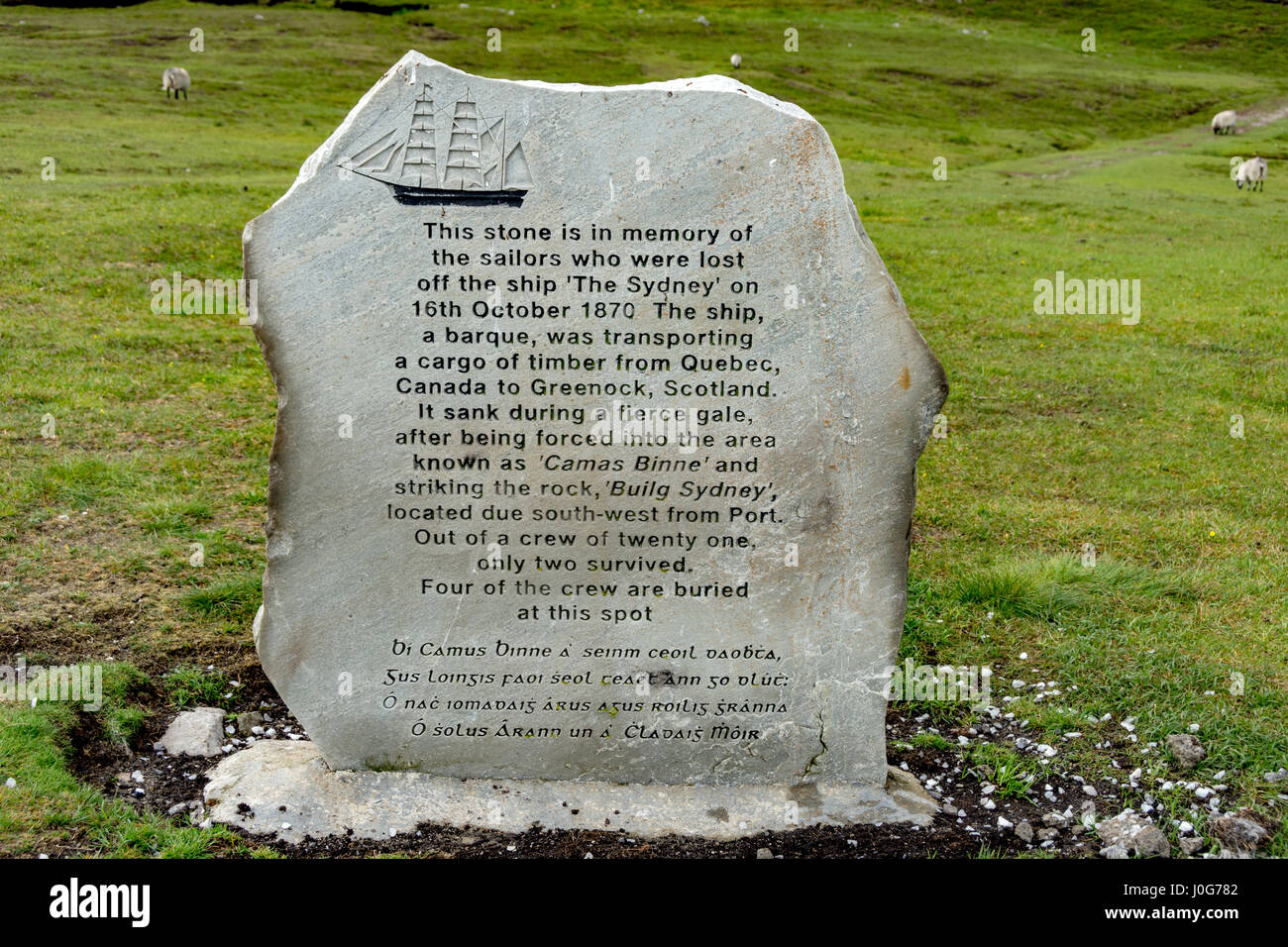 Inscribed stone commemorating the sinking of the barque 'The Sydney', with the loss of 19 lives, at Port (An Port), County Donegal, Ireland Stock Photo