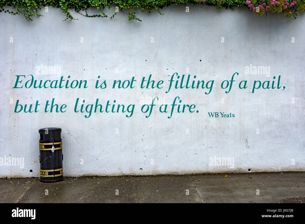 Quotation by the poet WB Yeats painted on a wall on The Mall, Sligo city, County Sligo, Ireland Stock Photo