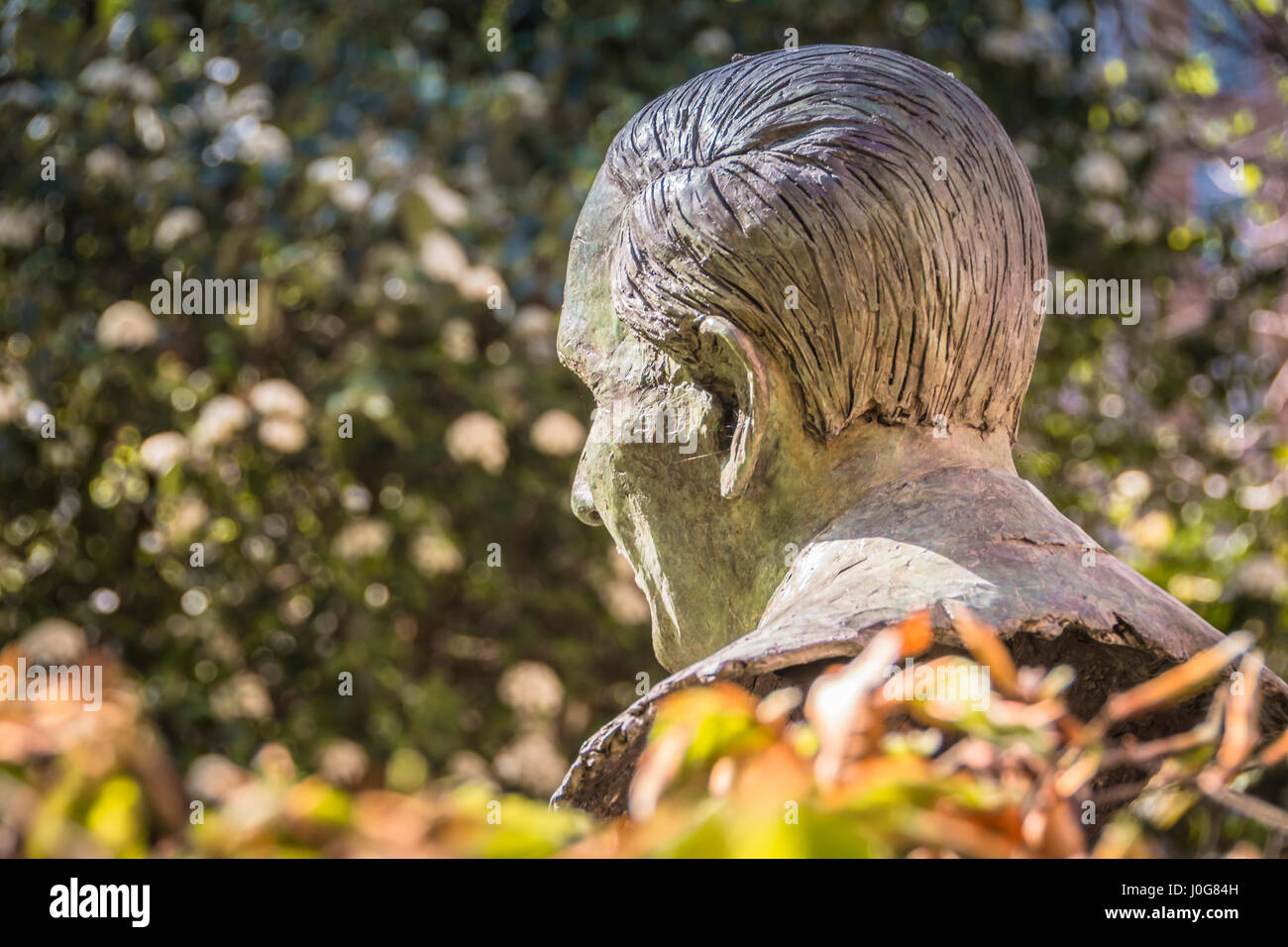 A bronze statue of Lord Wolfson in Queen Square, London, England, UK Stock Photo