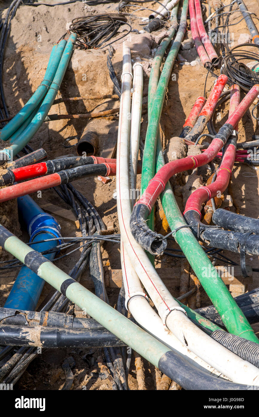 Cables, pipelines, tangle in a construction site, supply lines cleared ...