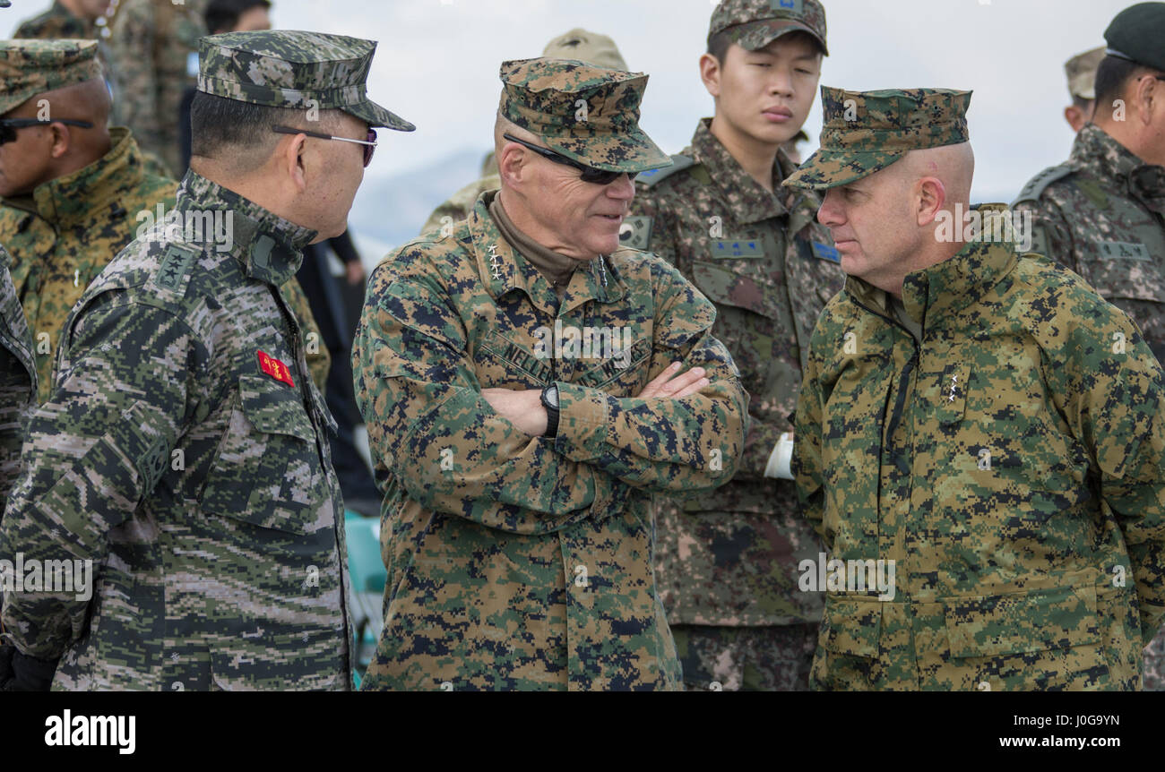 Commandant of the Marine Corps Gen. Robert B. Neller, center, speaks ...