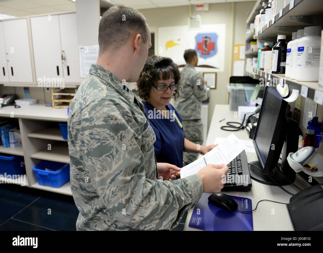 Members of the Altus Air Force Base pharmacy prepare a cold medication