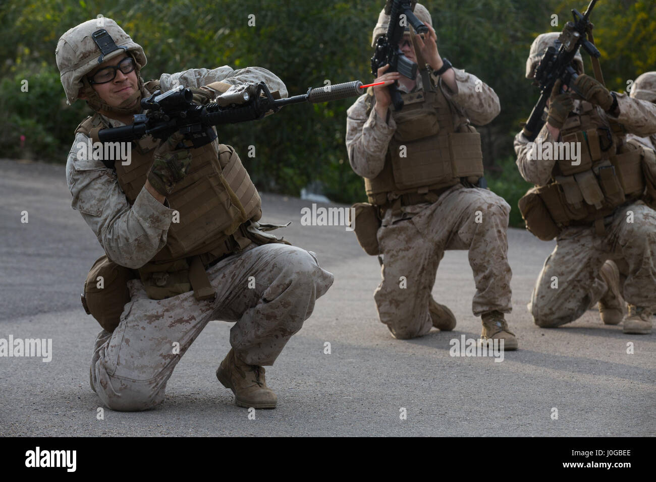 Marine Machine Gunner Fast Roping A U.S. Marine machine gunner conducts a speed reload drill in Israel ...