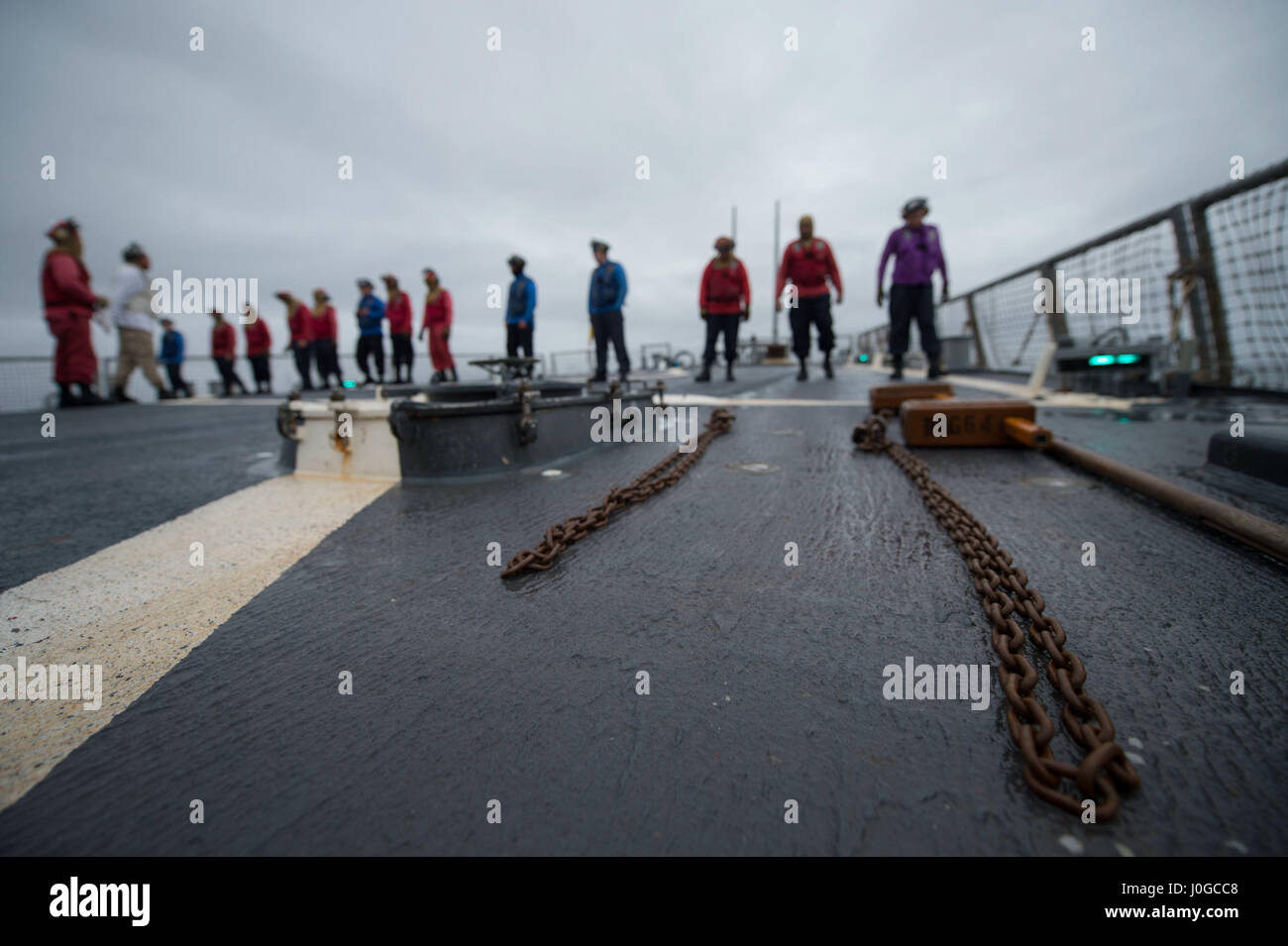 170331-N-ZE250-073   ATLANTIC OCEAN - (March 31, 2017) - Sailors aboard USS Carney (DDG 64) conduct a foreign object and debris walk down during flight quarters while the ship participates in exercise Joint Warrior 17-1 March 31, 2017. Carney, an Arleigh Burke-class guided-missile destroyer, forward-deployed to Rota, Spain, is conducting its third patrol in the U.S. 6th Fleet area of operations in support of U.S. national security interests in Europe. (U.S. Navy photo by Mass Communication Specialist 3rd Class Weston Jones/Released) Stock Photo