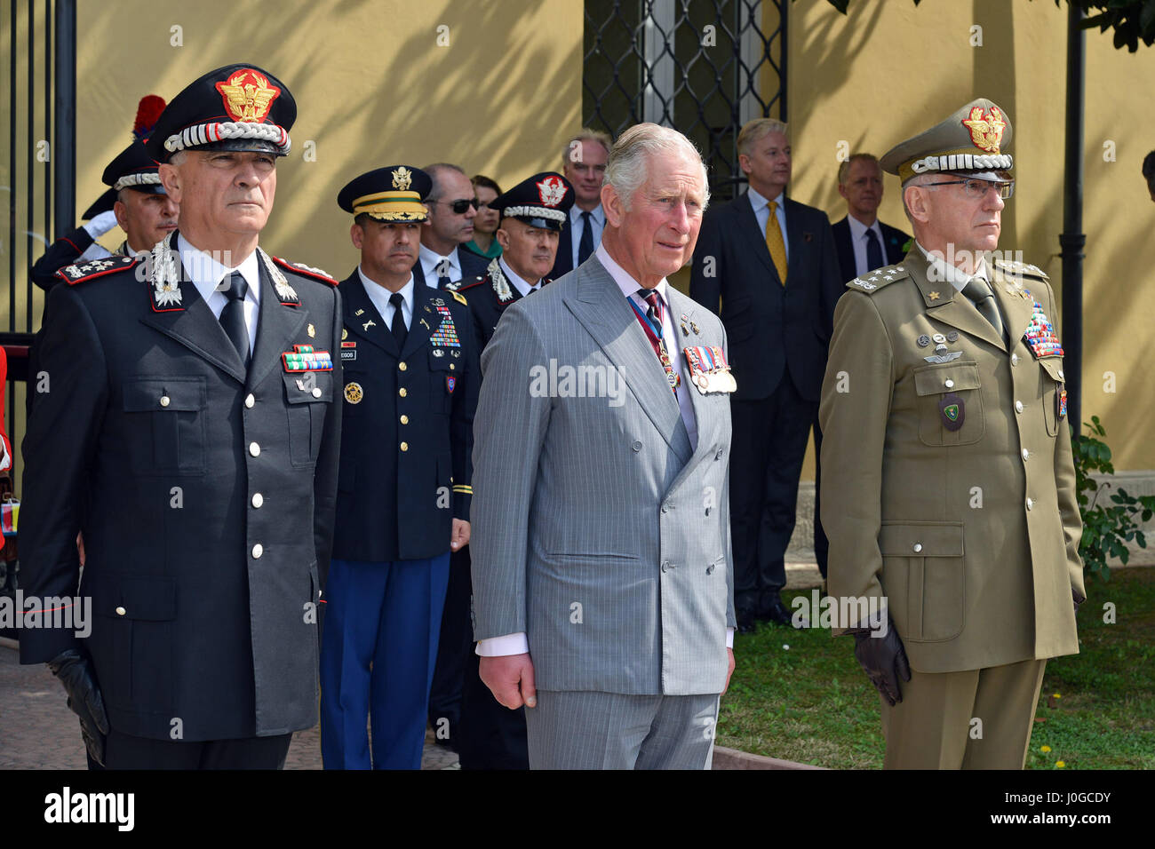 The Royal Highness, Prince Charles, Prince of Wales (center), Gen. Claudio Graziano, Italian Army Chief of Staff (right) and Gen. Tullio Del Sette, Italian Carabinieri General Commander (left), receive salute of honor at the end of the visit at Center of Excellence for Stability Police Units (CoESPU) Vicenza, Italy, April 1, 2017. (U.S. Army Photo by Visual Information Specialist Paolo Bovo/released) Stock Photo